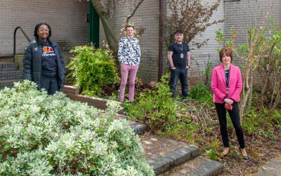 Charity staff and the people it helps create urban garden at homeless drop-in